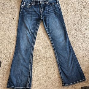Miss Me mid-rise boot cut jeans.